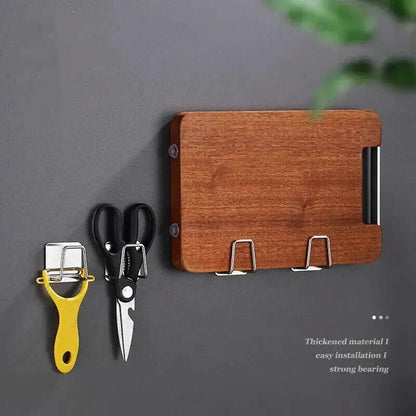 Wooden wall-mounted organizer with stainless steel sponge rack and scissors for efficient kitchen storage